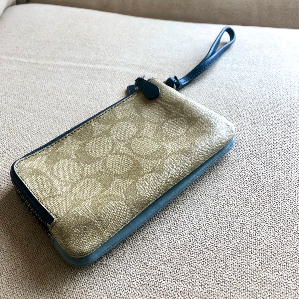 Coach blue double pocket monogram wristlet wallet